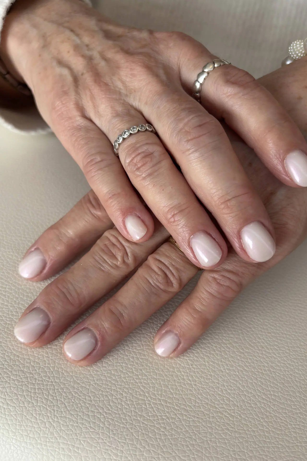 Soft white gel nails for mature hands