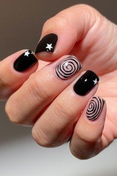 Black Swirl Art on Almond - elegant nail art idea for mature hands, women over 50