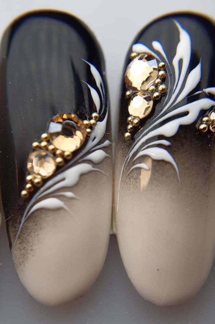 Black to white ombre with gold floral art, medium nails, ombre nail design for women over 60