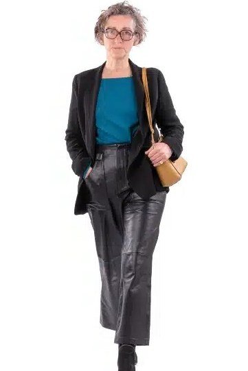 Black blazer with teal top and black leather trousers