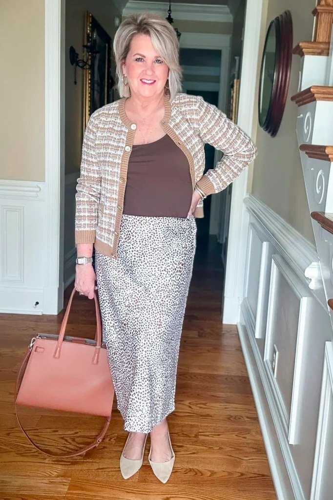 Striped cardigan a dotted midi skirt striped cardigan grey midi skirt pink bag 50s - fall outfit idea for women over 40