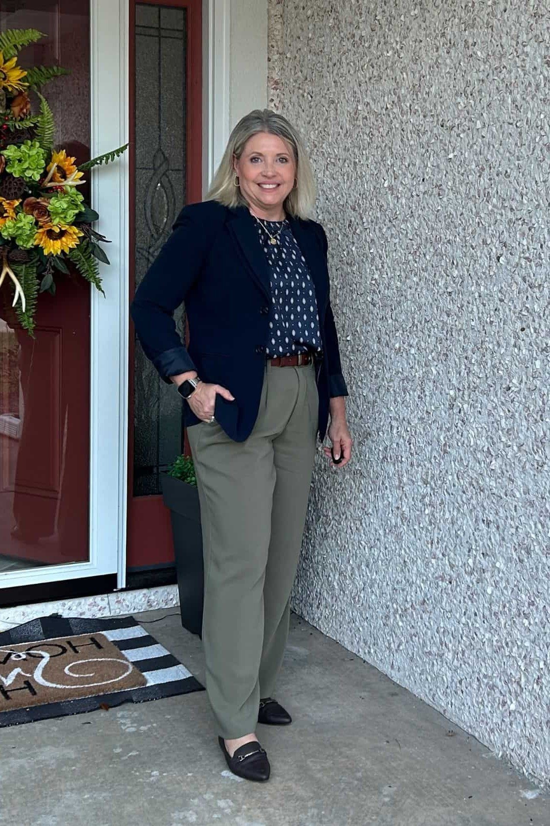 Navy Blazer with a Patterned Top and Blue Jeans on a woman over 50, fall outfit idea