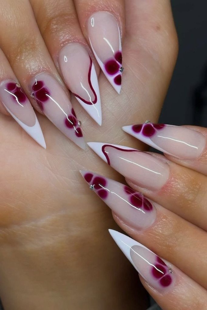 White french nails with cherry blossom nail art