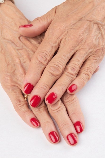 Bright Red on Mature Hands nail design for women over 40