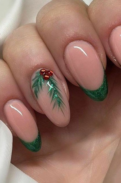 nude nails with green glitter french tips and pine art