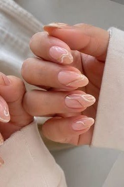 Gold Glitter Nude Nails - nude nail art idea for women over 40