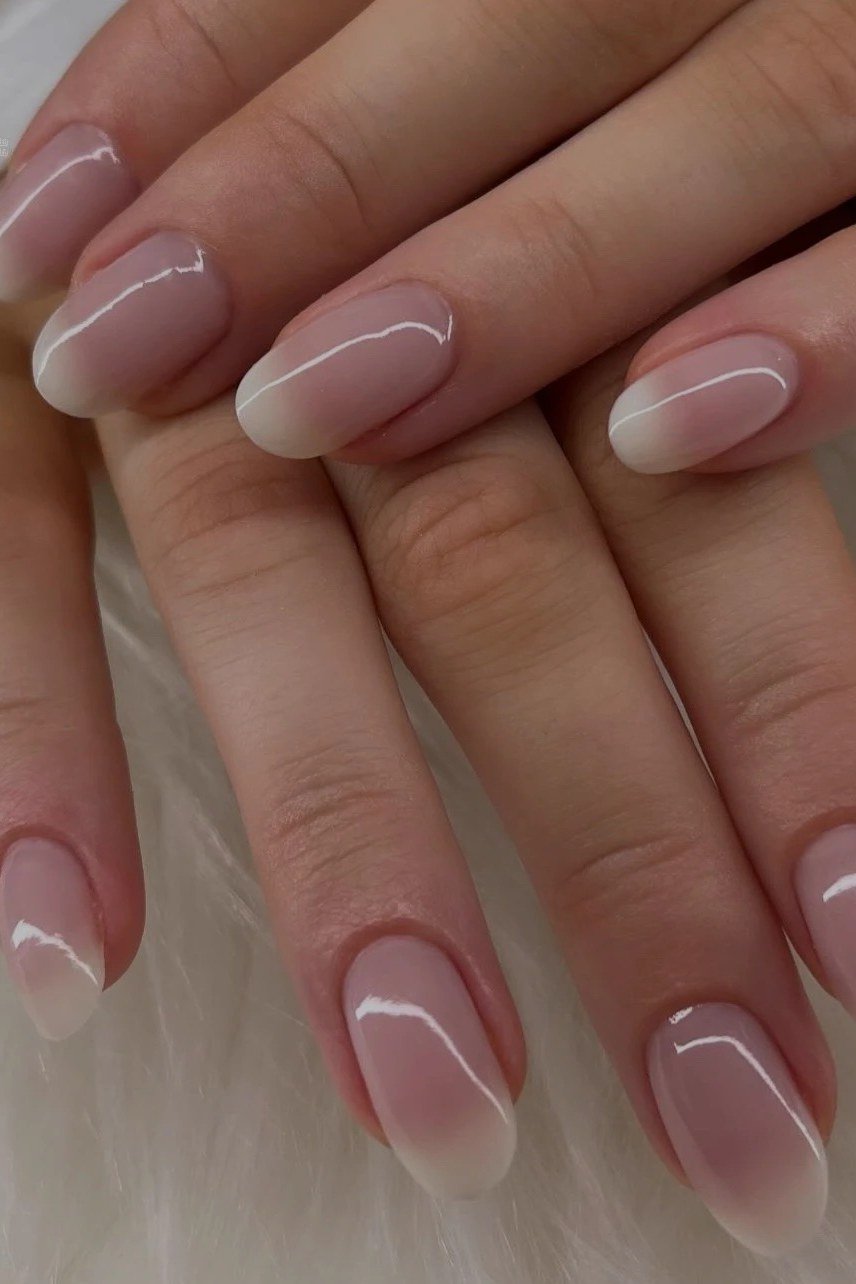 pink white baby boomer fade on medium almond nails