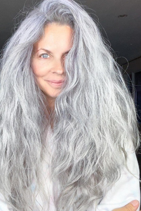 Extremely long silver wavy hair for women over 50