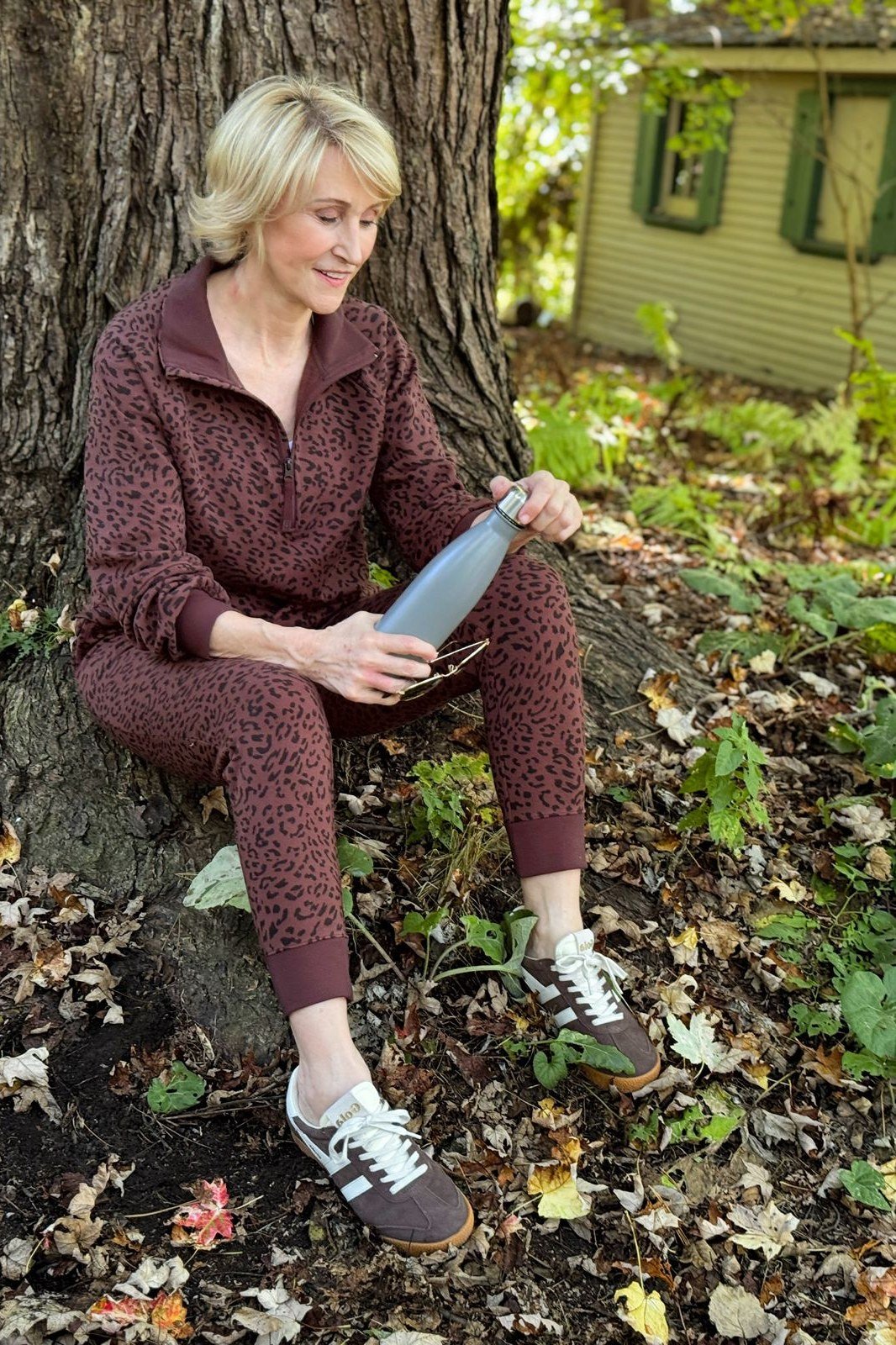 Woman over 50 wearing maroon quarter-zip set, everyday casual outfit idea