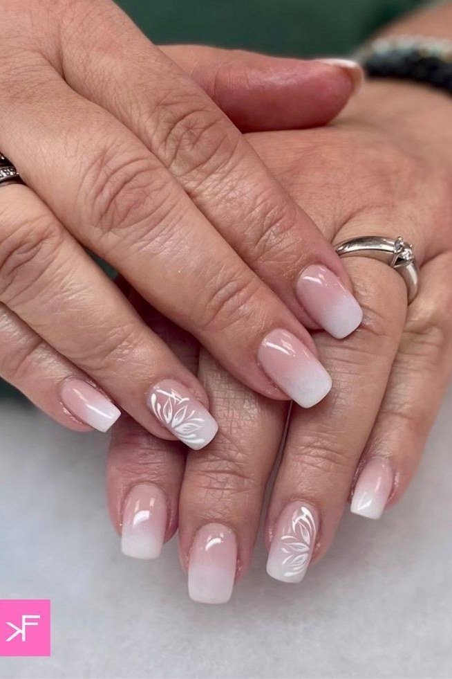 White ombre with lace art on mature hands, ombre nail design for women over 60