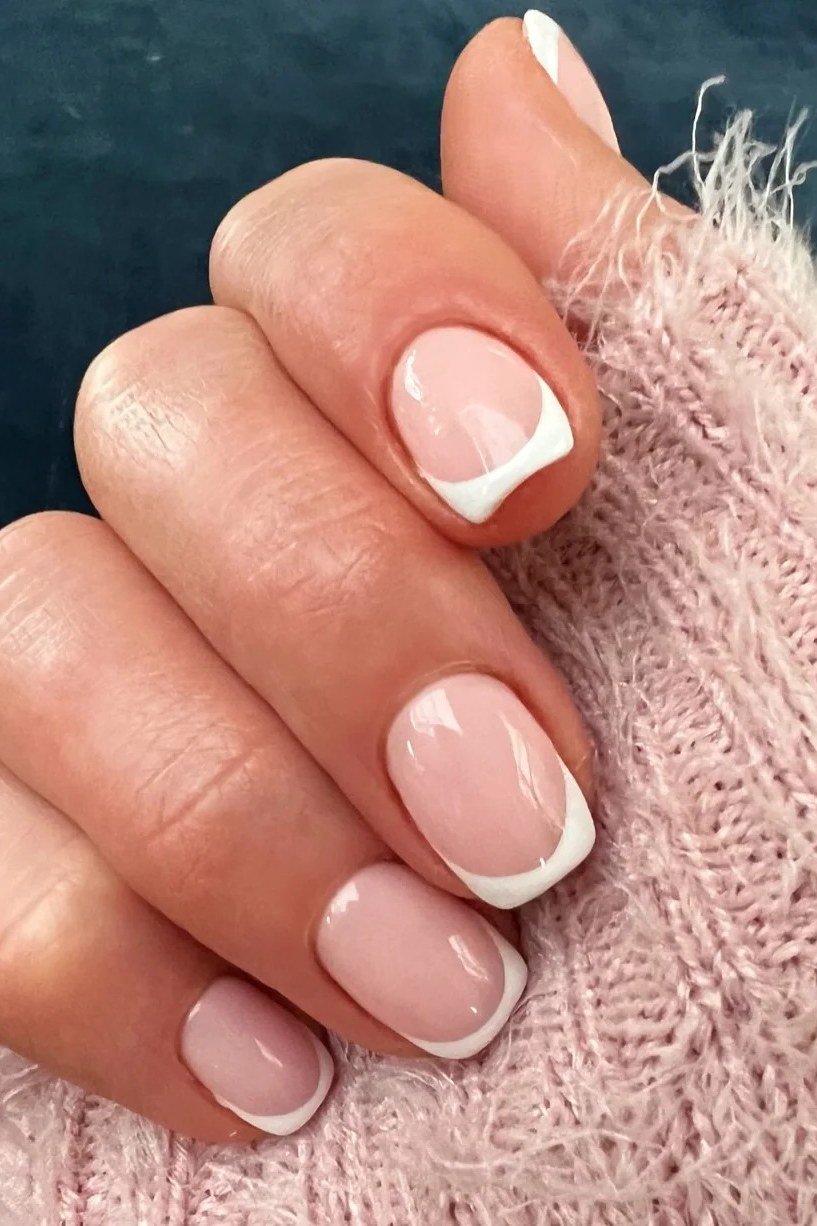 White french tip cozy knit nails for women over 50