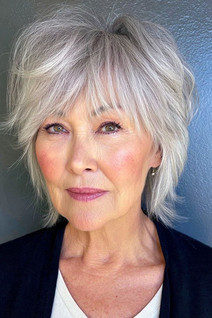 silver shaggy medium with bangs for women over 60