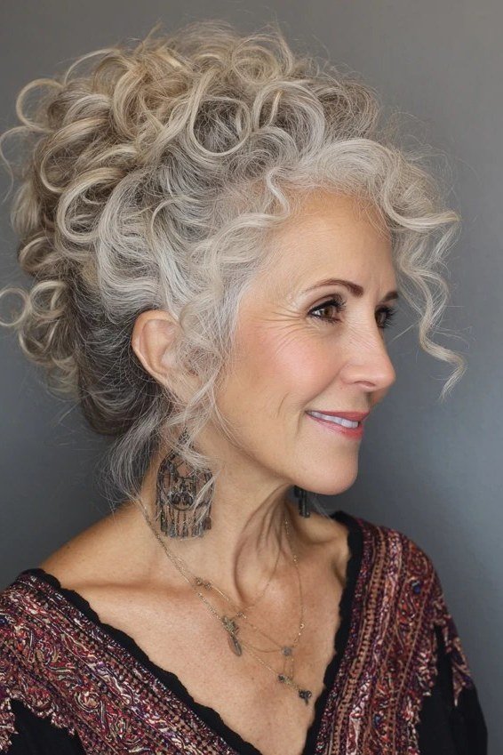 Elegant silver curly updo for women over 50