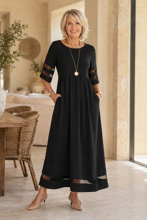 Black sheer-sleeve maxi dress for women over 50