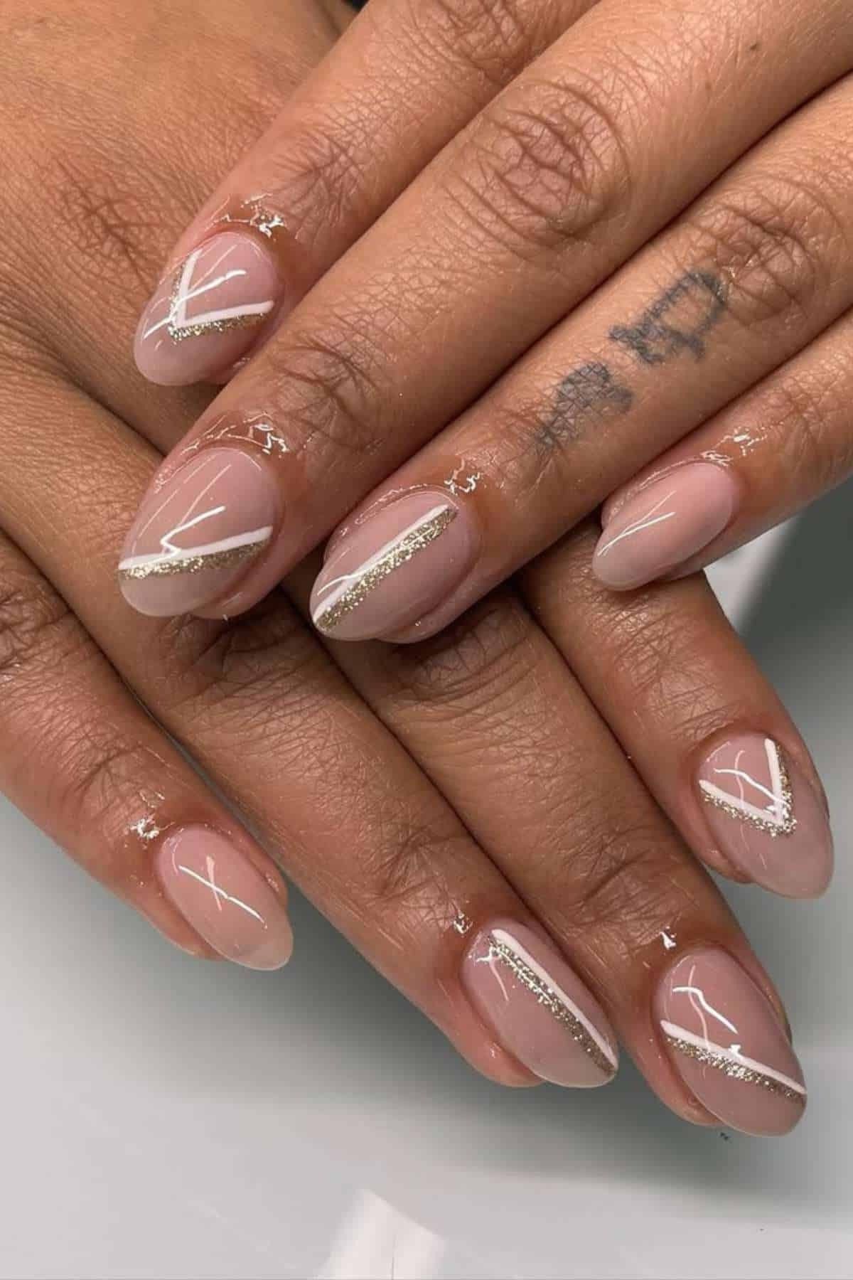 Silver Diagonal Line Nails - nude nail art idea for women over 40