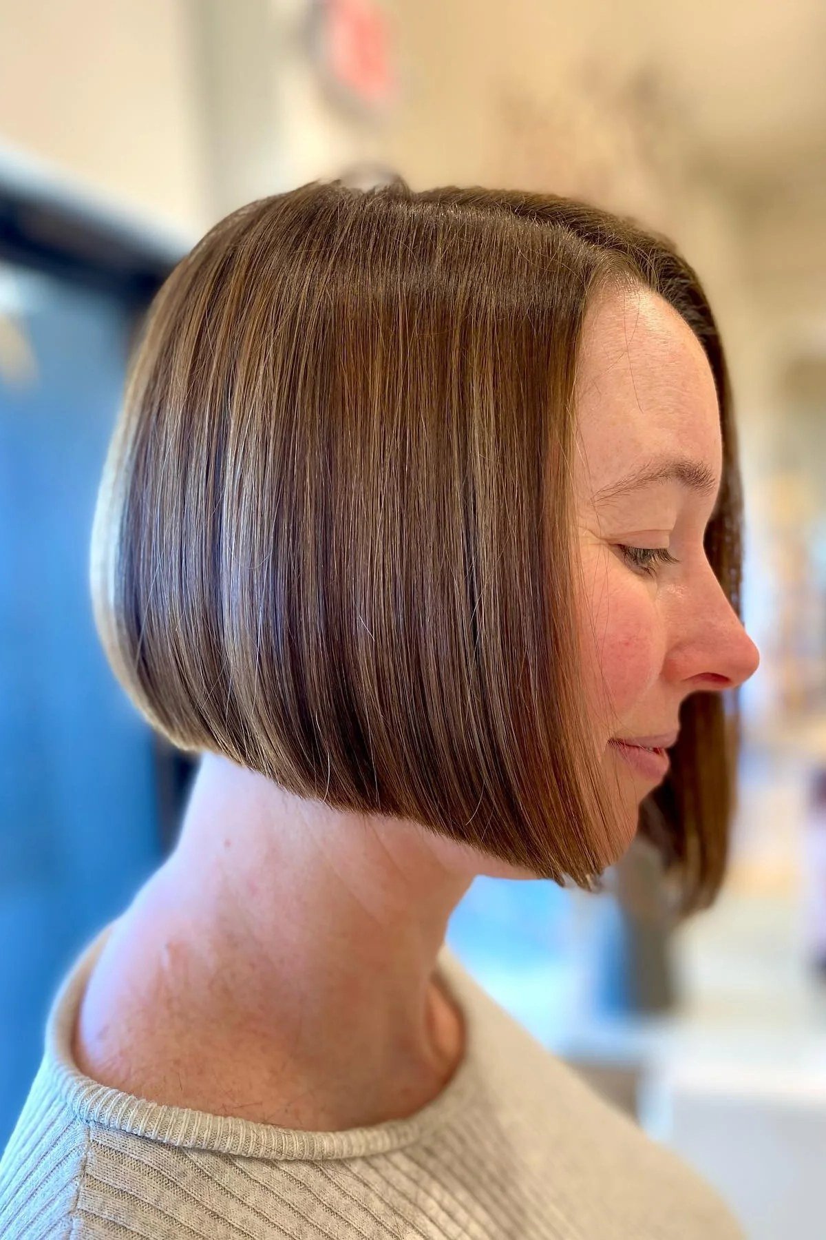 Sleek copper-brown french bob with side part