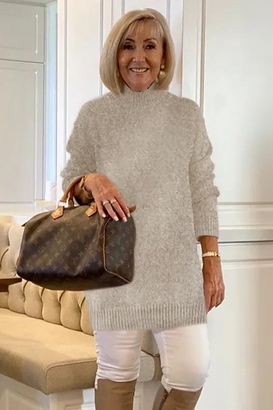 Easy casual outfit idea for women over 50: cream fuzzy sweater and white jeans, older woman everyday style