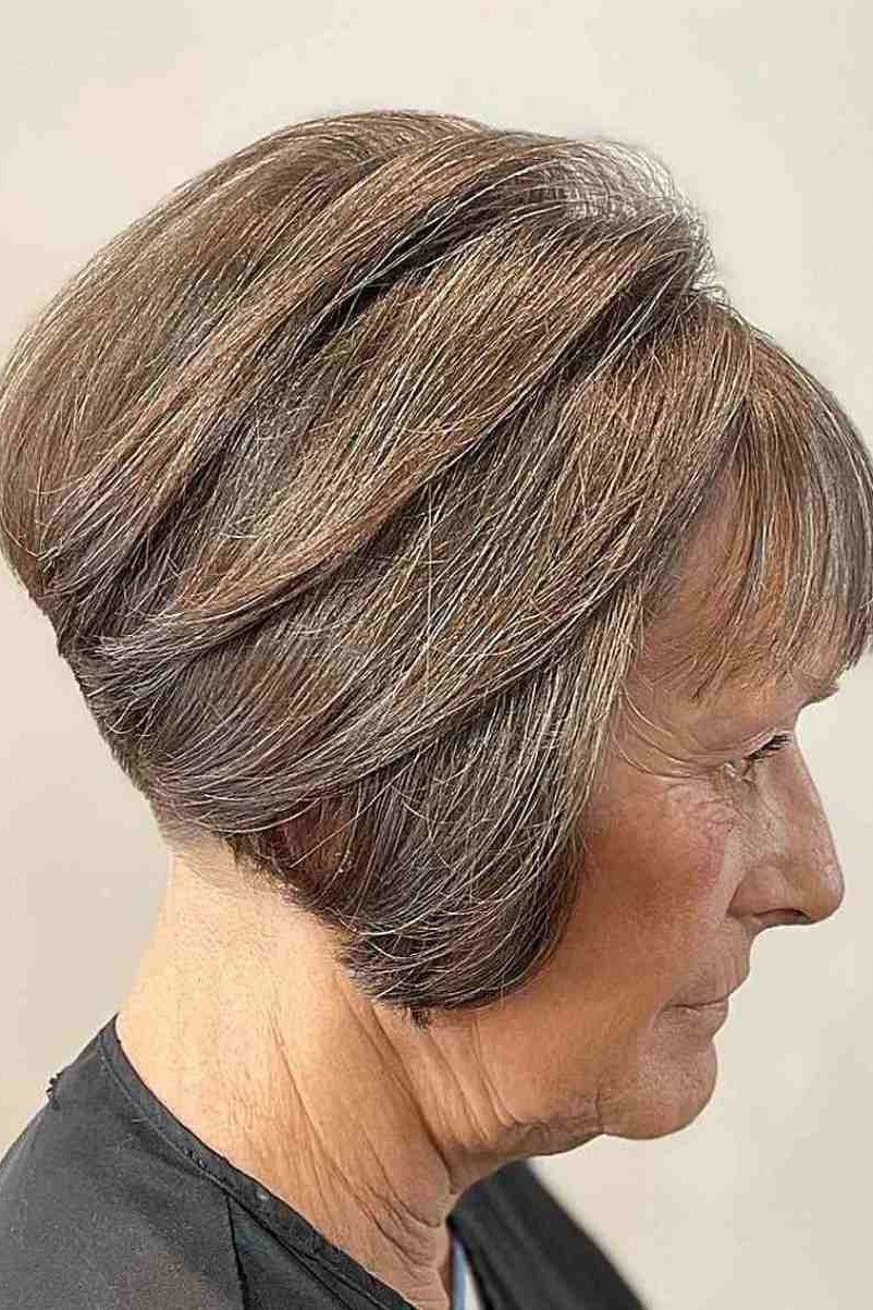 Silver-Grey Wedge With Tapered Back on a woman over 50 - flattering wedge haircut idea