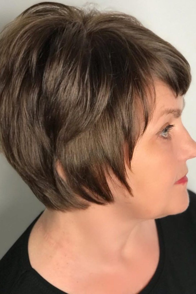 Chocolate-Brown Wedge Bob on a woman over 50 - flattering wedge haircut idea