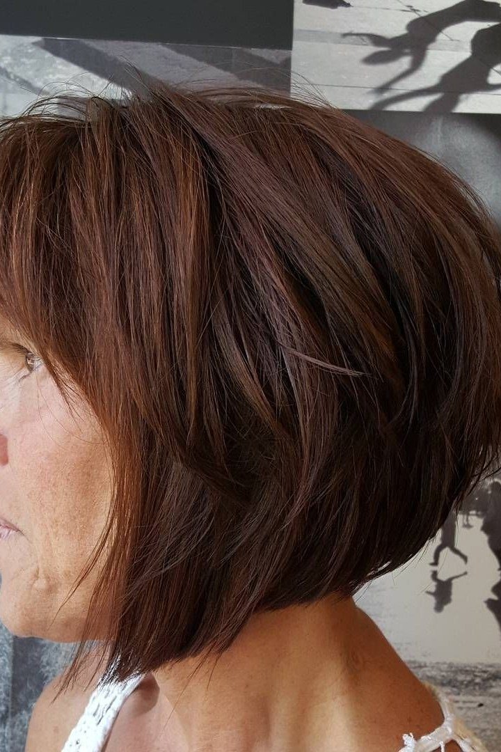 Dark Brown Wedge on a woman over 50 - flattering wedge haircut idea
