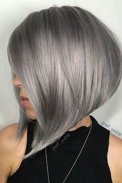 White asymmetric bob with one side longer past the jaw
