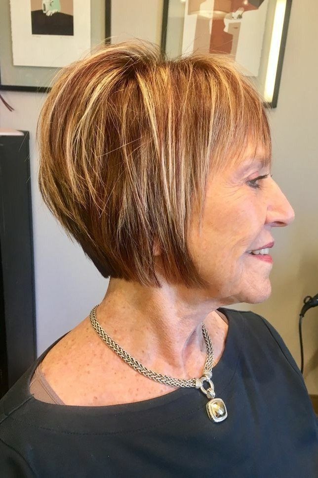Copper-ginger stacked asymmetric bob with crown volume