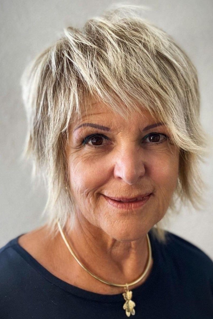 Blonde layered asymmetric pixie-bob