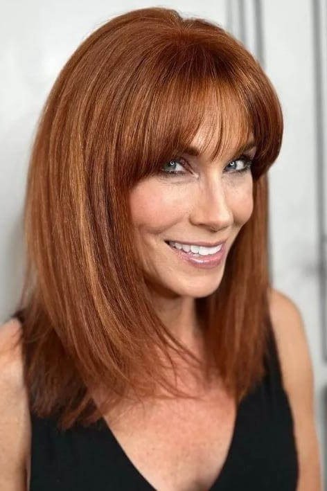 Copper Red Long Straight Layered Hair with Bangs for Women Over 40