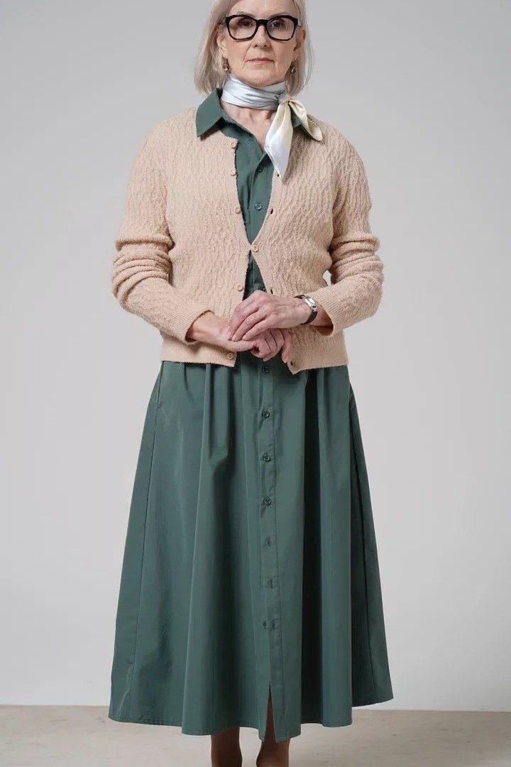 Tan cardigan with green button midi skirt, office outfit