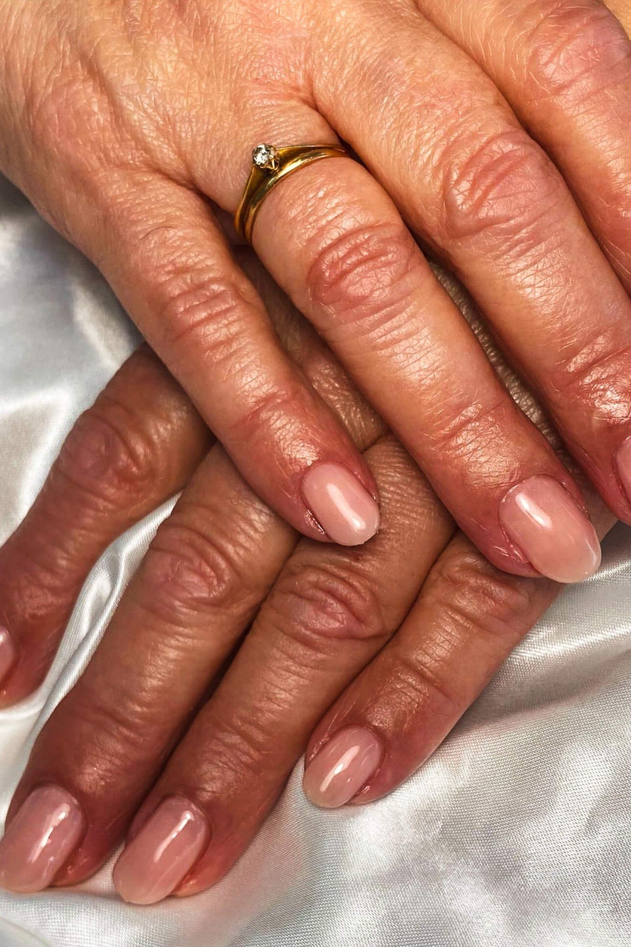 Natural Nude Almond Nails, best nail colors for 50 year olds