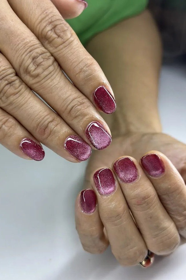Plum Polish with Pink Glitter Accents, best nail colors for 50 year olds