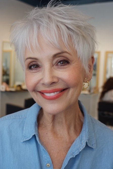 Textured white pixie cut with choppy crown volume for older women