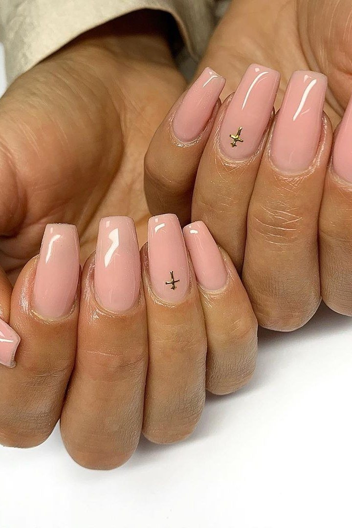 Pink almond nails with tiny cross accent, two hands, builder gel over 50