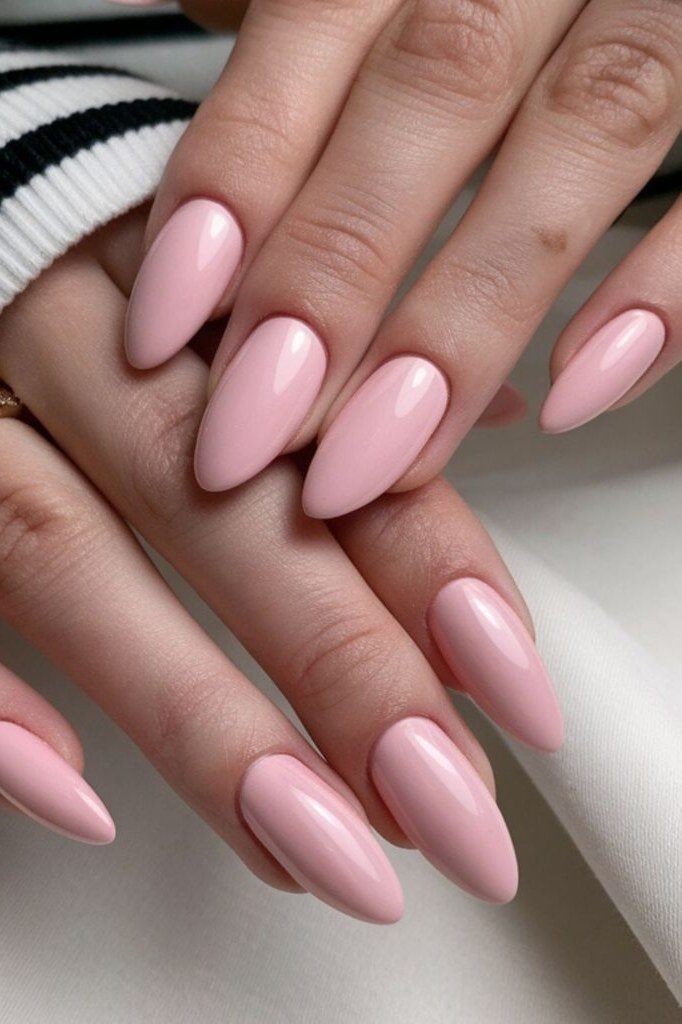 Pink almond medium nails with striped sleeve, builder gel manicure over 50