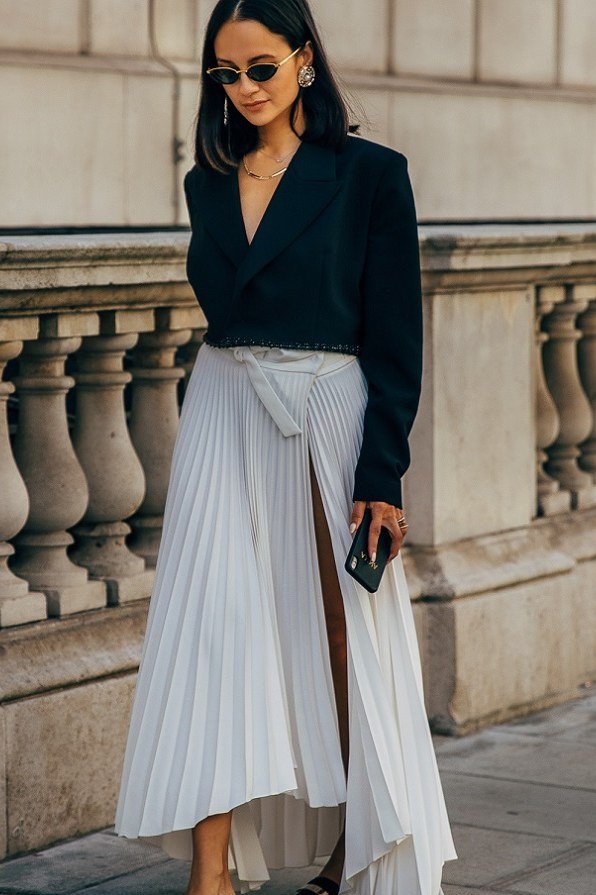 cropped black blazer with silver pleated skirt for women over 50