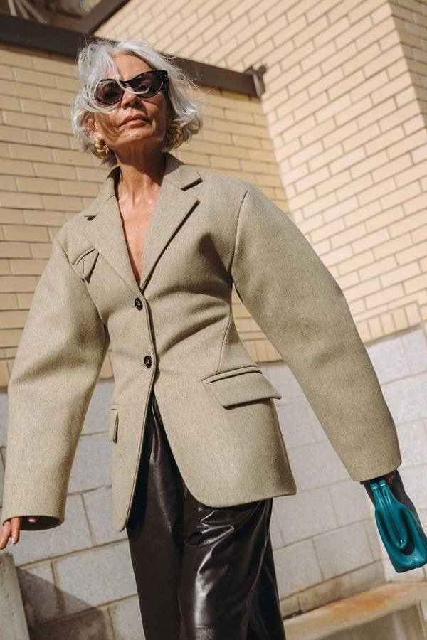 tan oversized blazer with leather pants outfit for older women
