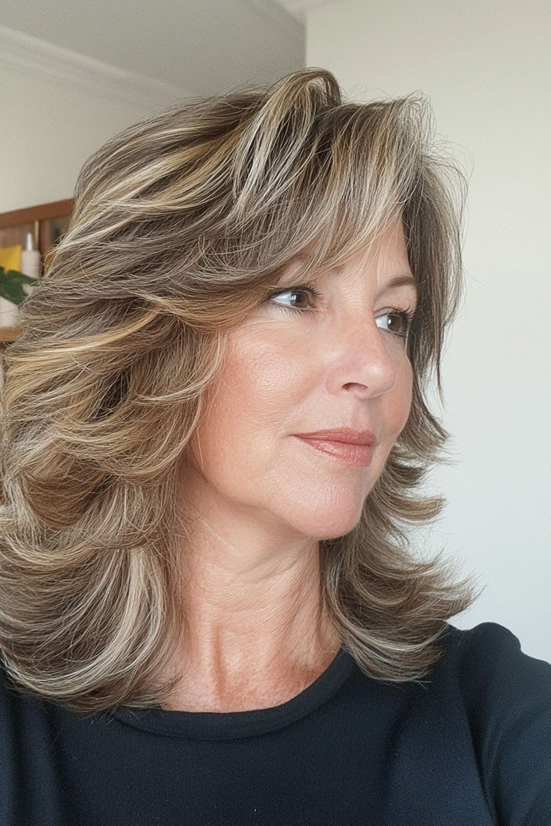 Blonde Smooth Blowout - shoulder-length blowout hairstyle for women over 60