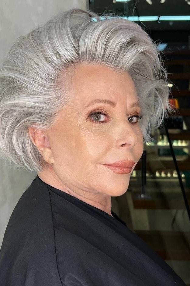 Voluminous White Blowout - shoulder-length blowout hairstyle for women over 60