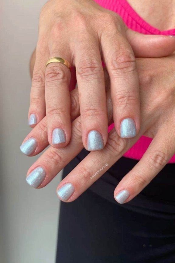 Pale blue short nails for women over 50