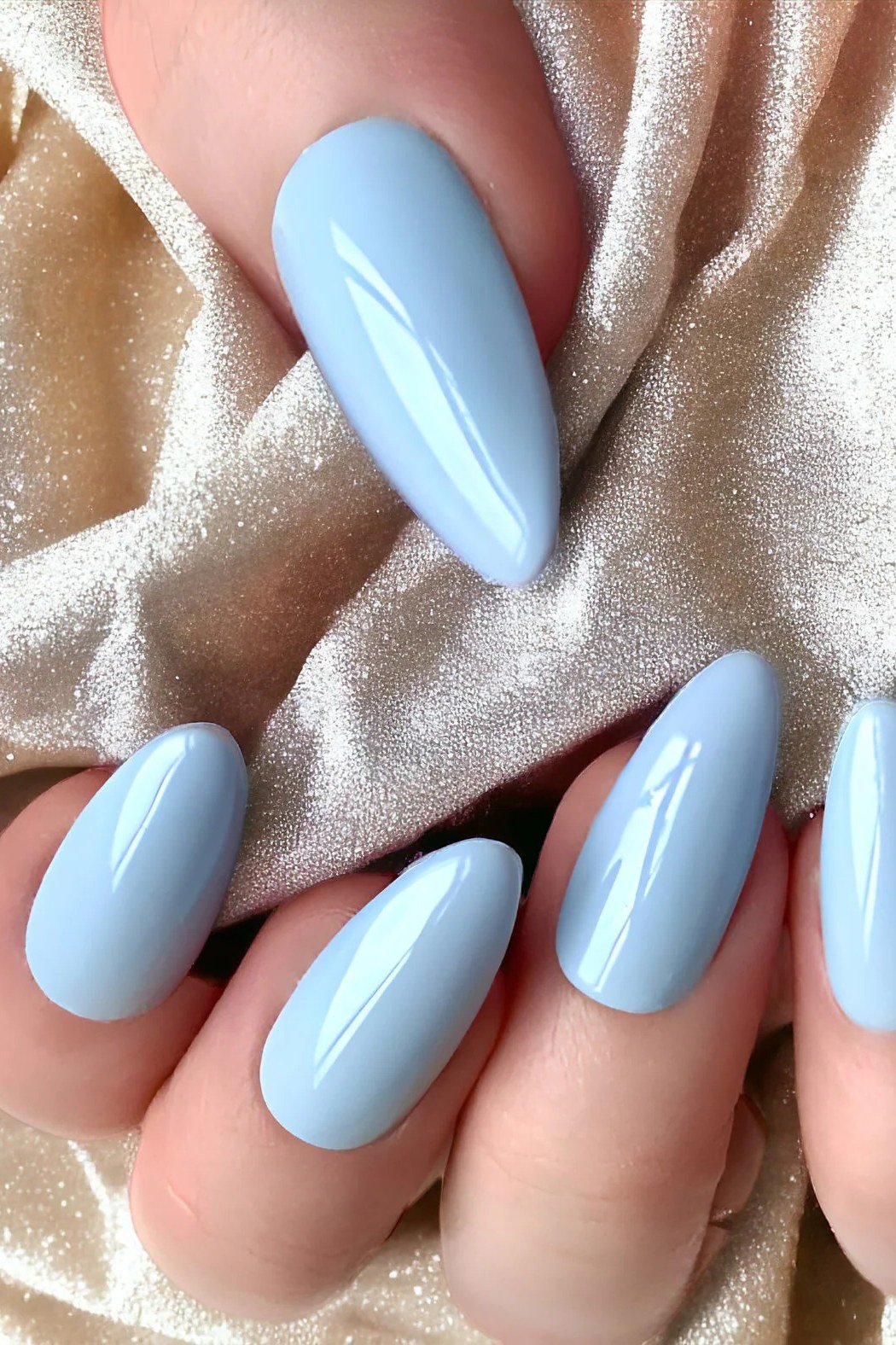Light blue satin almond nails for women over 50