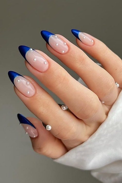 Nude nails with royal blue french tips for women over 50