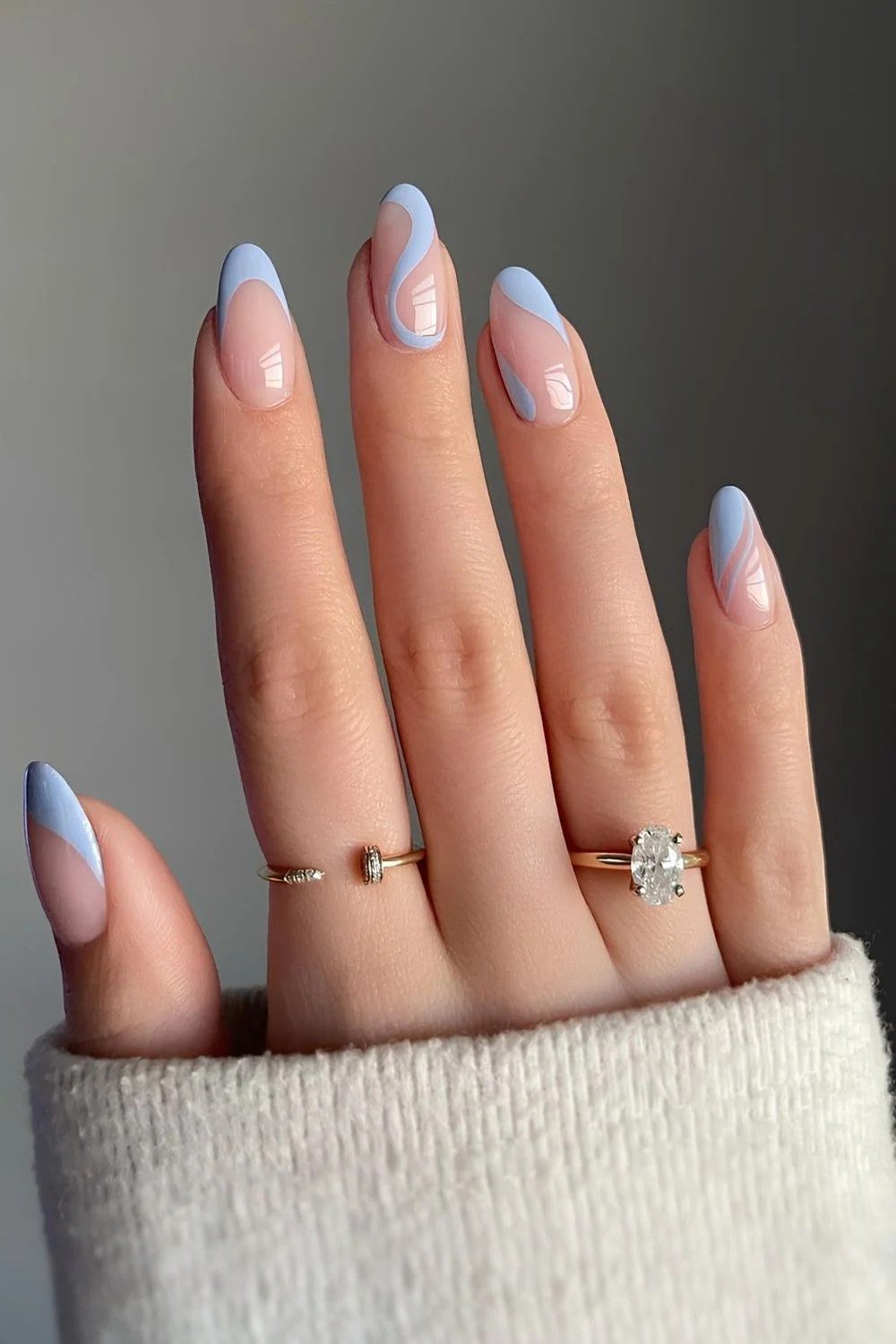 Nude nails with light blue french tips for women over 50