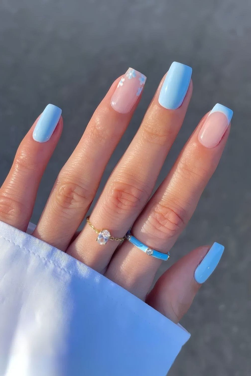 Baby blue french tip almond nails for women over 50