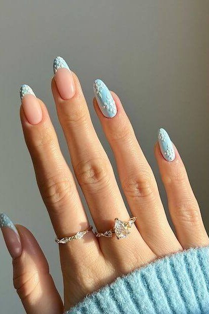 Light blue almond nails with white french tips for women over 50