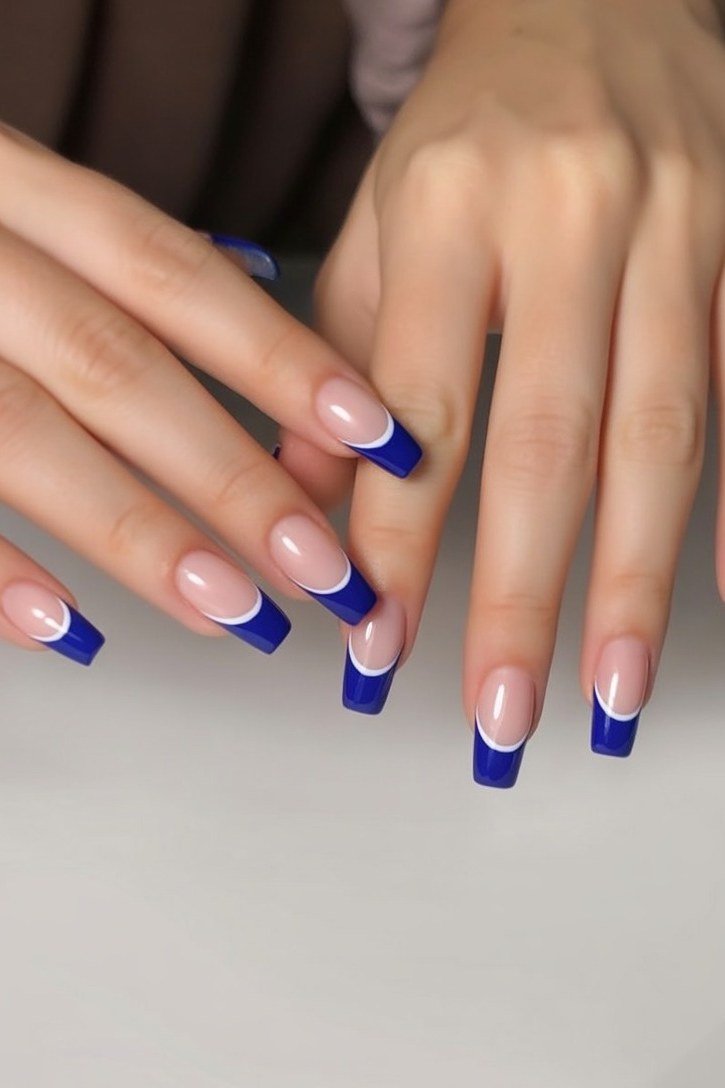 Nude square nails with royal blue french tips for women over 50