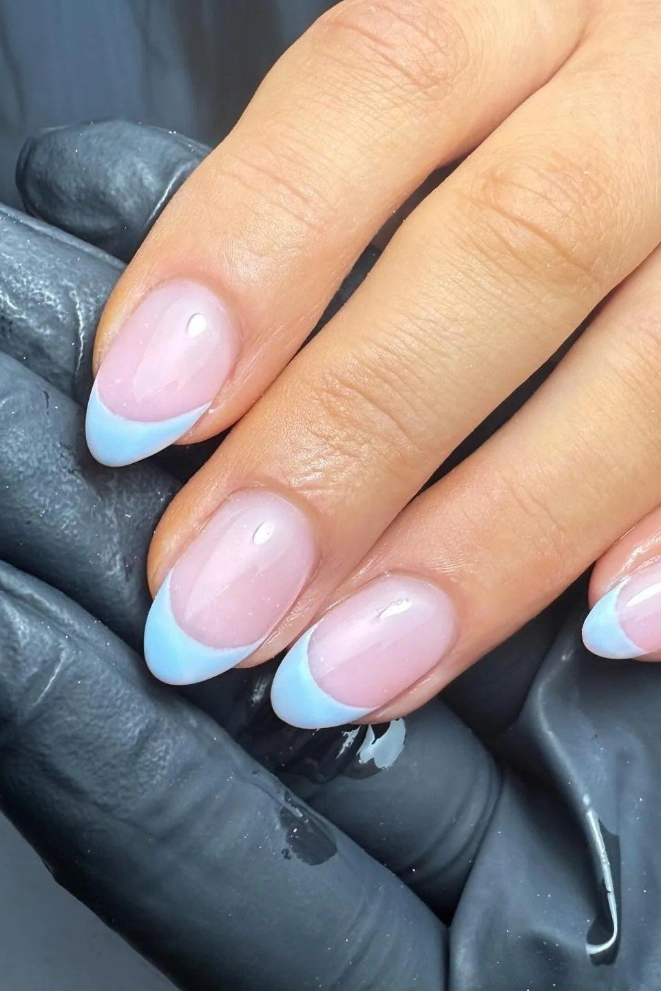 Pale pink and blue ombre french nails for women over 50