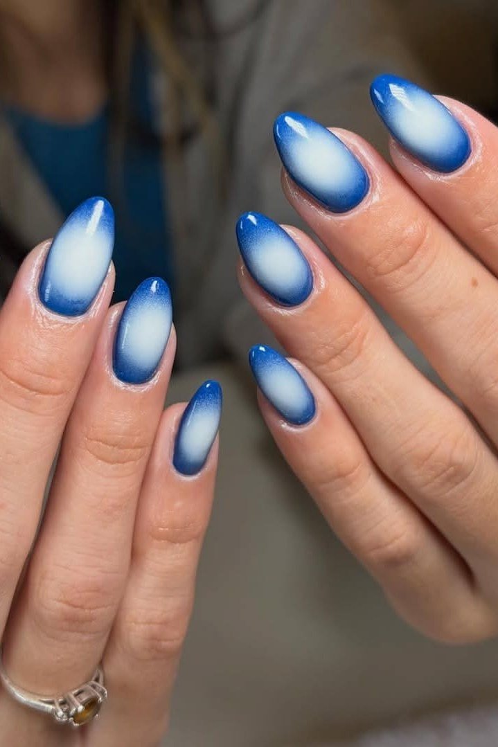 Blue and white aura ombre nails for women over 50