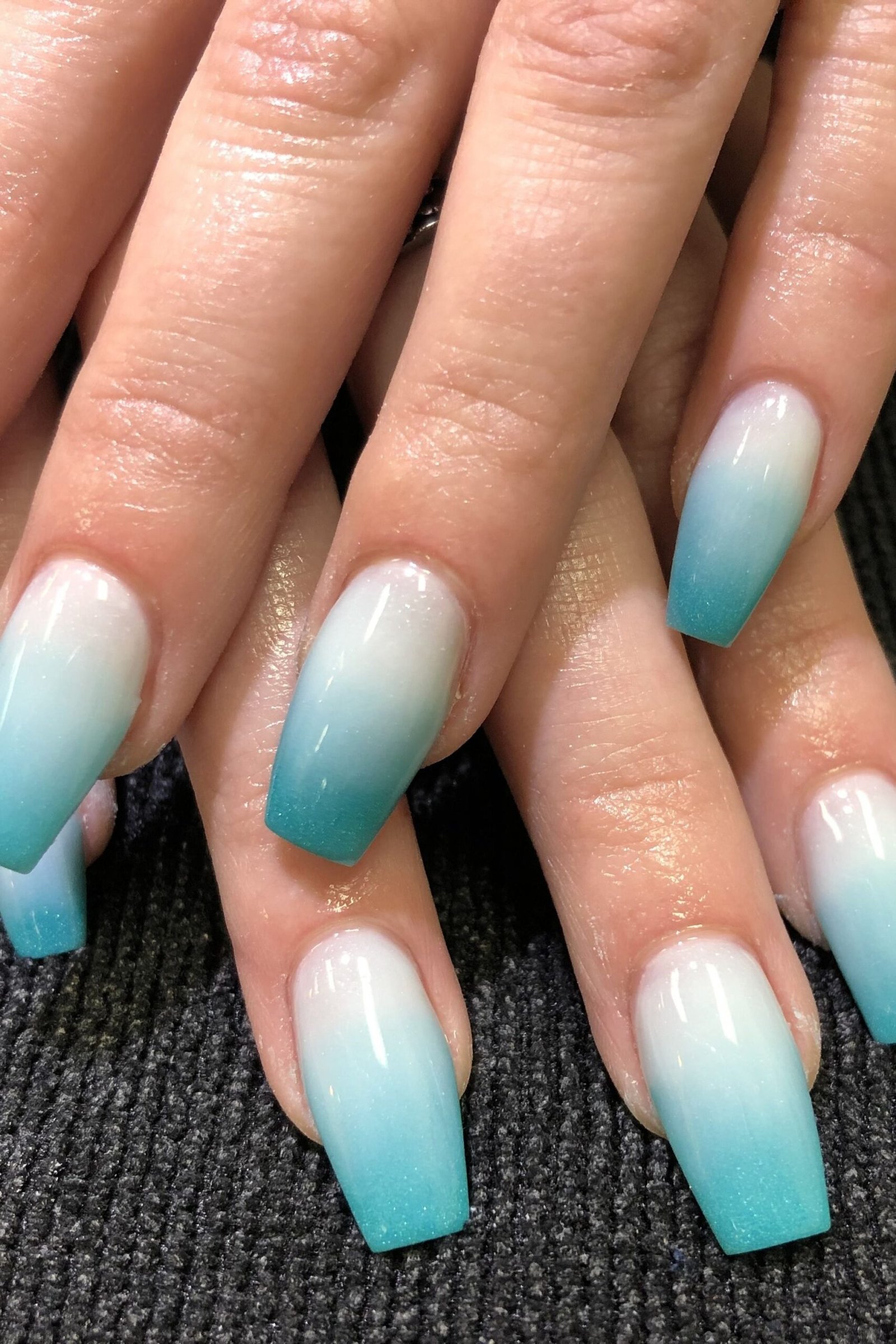 Turquoise ombre nails for women over 50