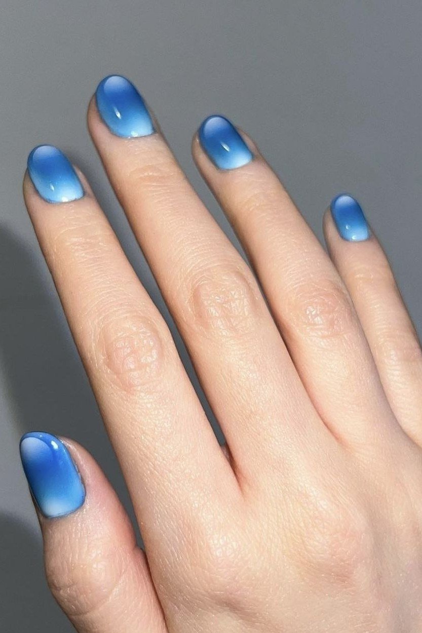 Blue aura ombre nails for women over 50