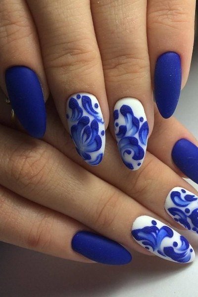 Royal blue and white porcelain nail art for women over 50